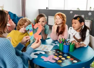 medium shot kids sitting together table 23 2149355251